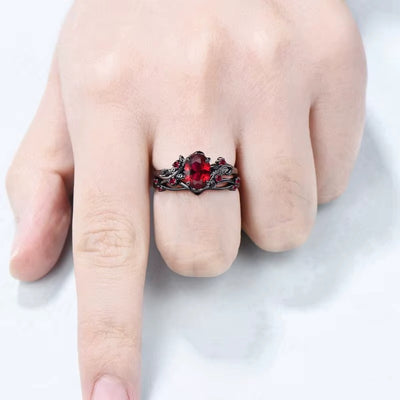 Anello Fiore con Pietra Rossa e Dettagli Neri