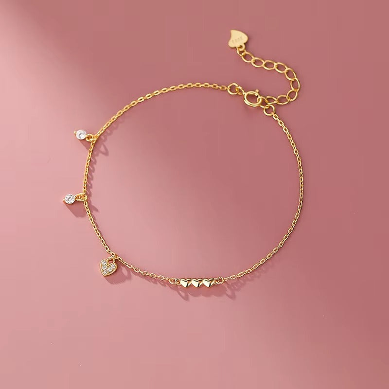 Bracciale Cuori in Argento 925 Placcato Oro 14 K con Zirconi – Minimal e Raffinato