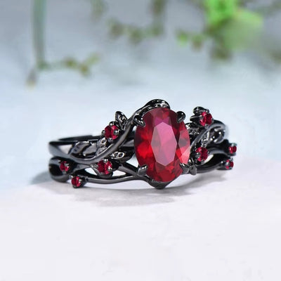 Anello Fiore con Pietra Rossa e Dettagli Neri